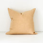 Foxtrot Home French Flax Linen styled in a bedroom with Tawny Peach Cushion Cover.