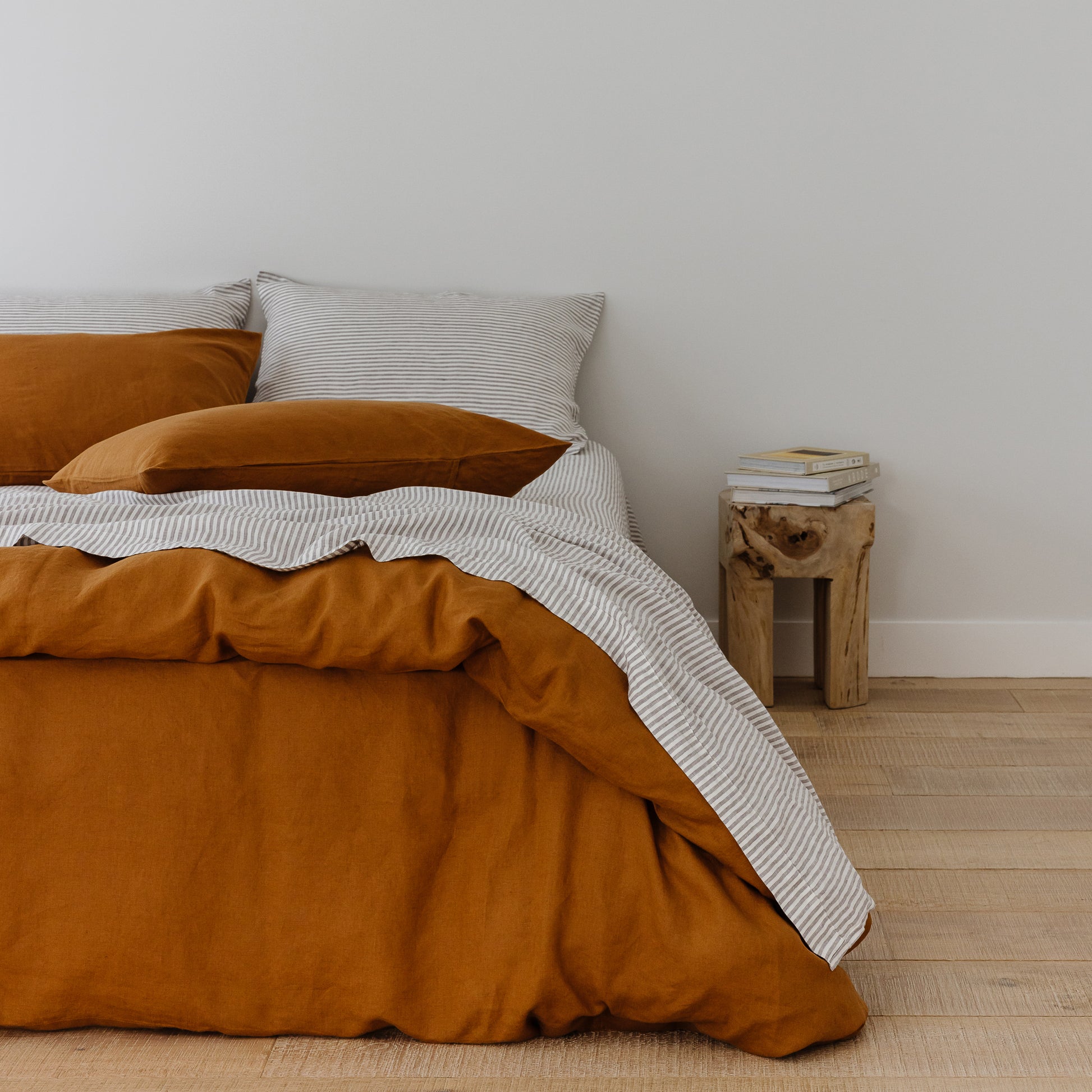 Foxtrot Home French Flax Linen styled in a bedroom with Tobacco Duvet.
