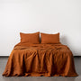 Foxtrot Home French Flax Linen styled in a bedroom with Tobacco Flat Sheet.