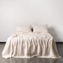 Foxtrot Home French Flax Linen styled in a bedroom with Tobacco Stripes Pillowcases.