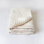 Foxtrot Home French Flax Linen styled in a bedroom with Tobacco Stripes Pillowcases.