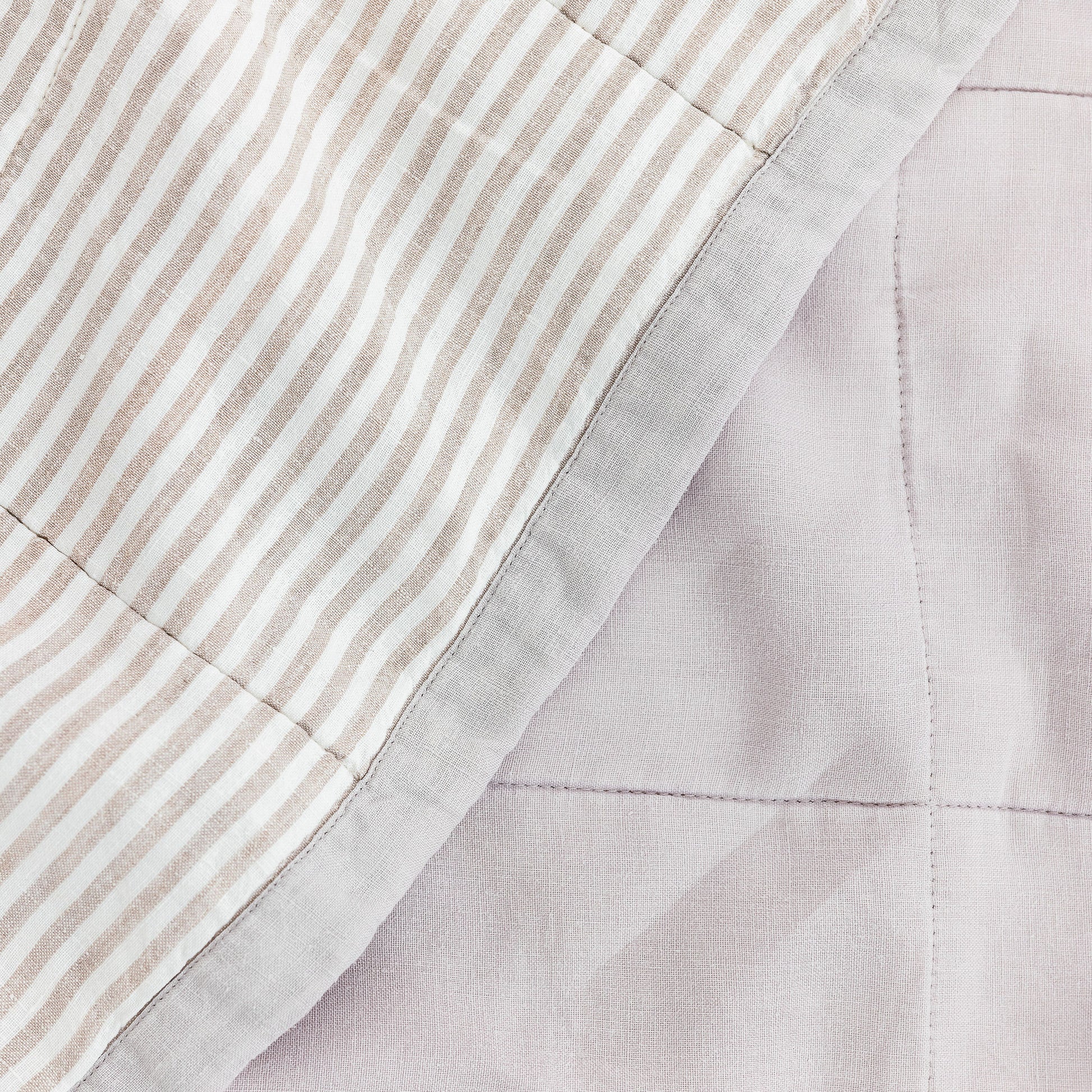 Foxtrot Home French Flax Linen Lilac Quilt with Grey Stripes on the reverse