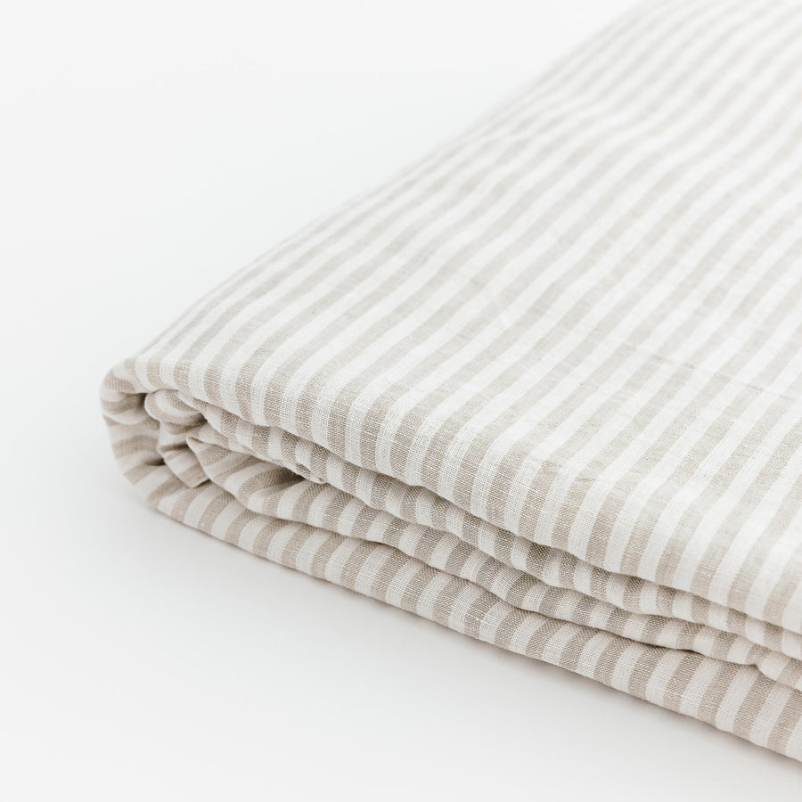 Foxtrot Home French Flax Linen bedroom styled with Sand Stripes Fitted Sheet