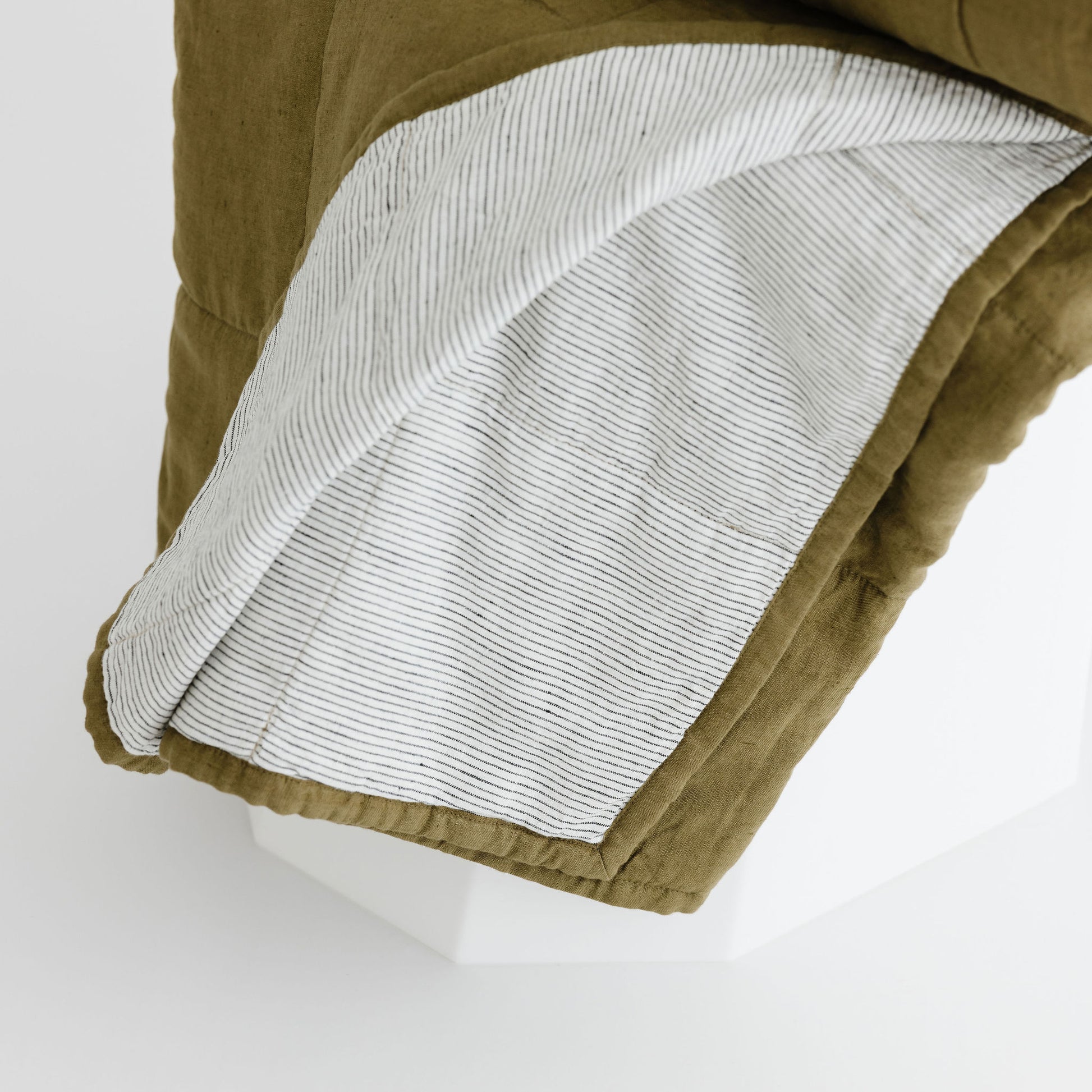Foxtrot Home French Flax Linen Quilt in Olive with Pinstripes on the reverse