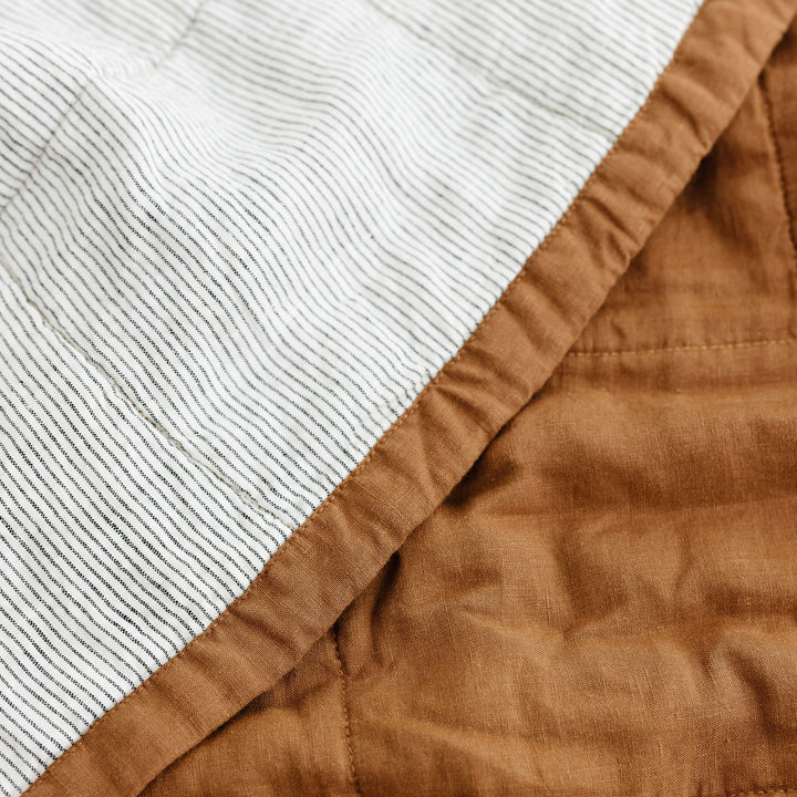 Foxtrot Home French Flax Linen Quilt in Tobacco with Pinstripes on the reverse