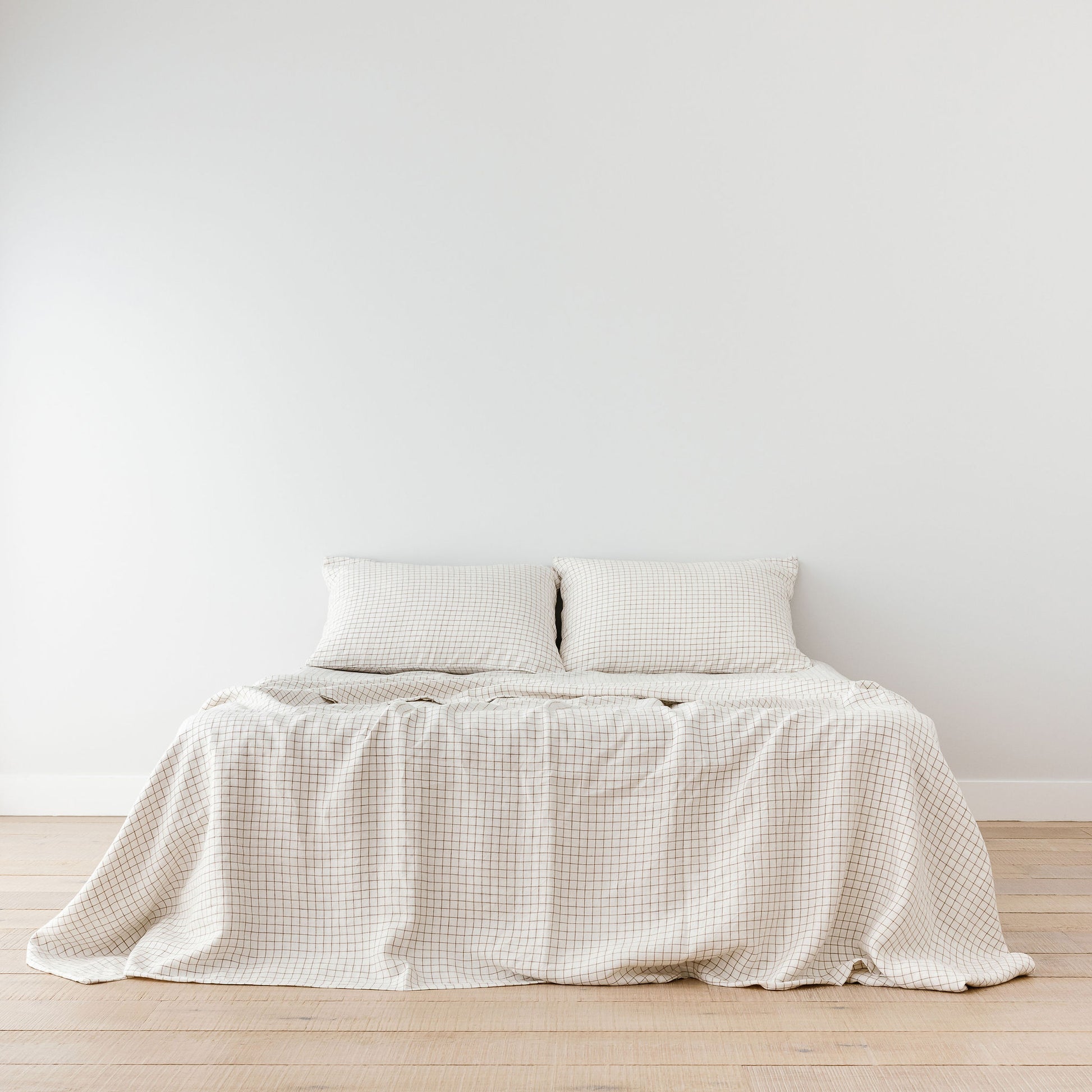 Foxtrot Home French Flax Linen styled in Malt Brown Grid Sheets