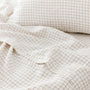 Foxtrot Home French Flax Linen styled with Malt Brown Grid PIllowcases